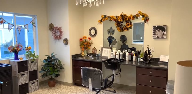 Hair salon area with beauty products and decor