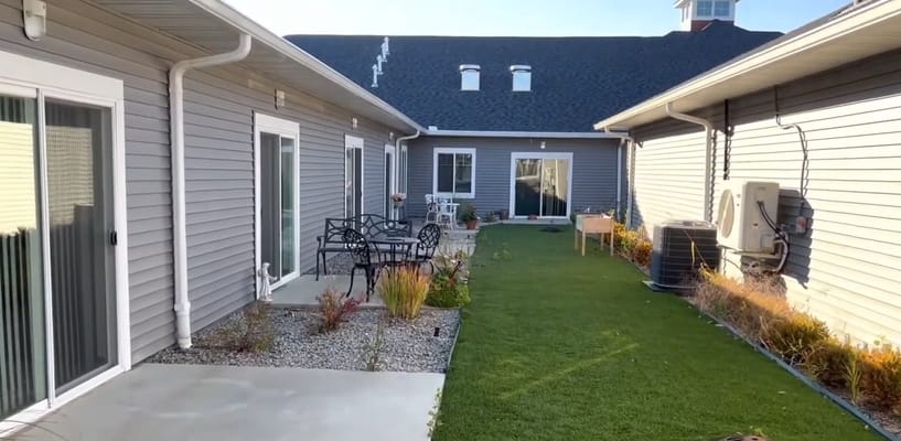Outdoor space with seating and landscaped garden