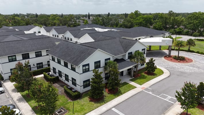 Aerial view of the facility building and surroundings