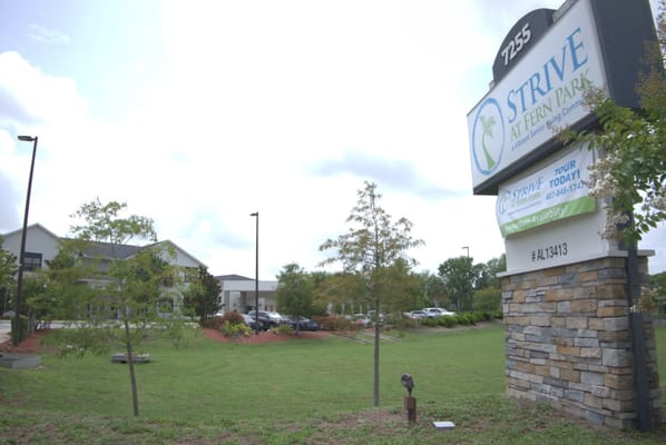 Exterior view of Strive At Fern Park with signage