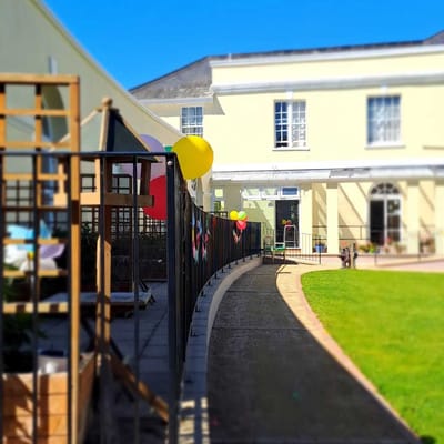 Outdoor view of facility with decorations and pathway