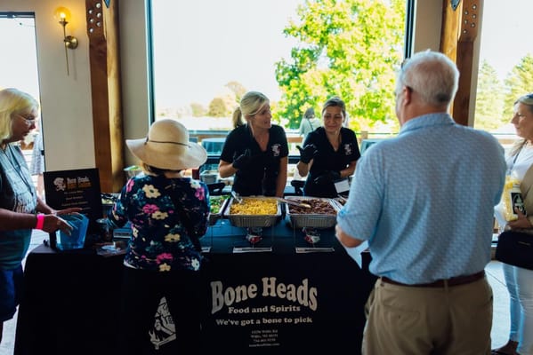 Residents enjoying a food tasting event in a common area