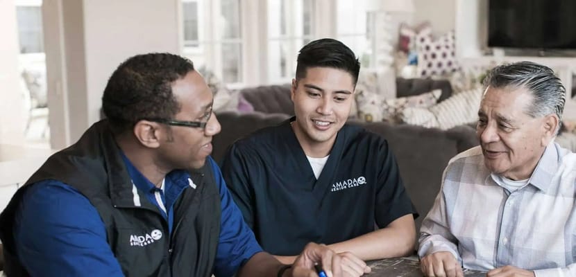 Staff interacting with a resident in a comfortable setting