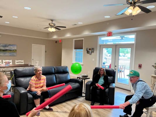 Residents participating in an indoor activity session