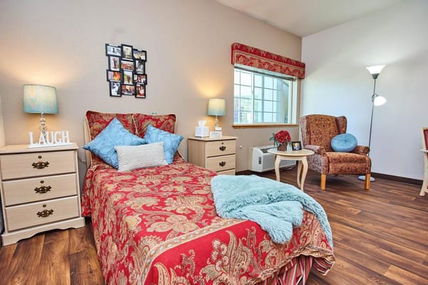 Cozy resident room with warm decor and furniture