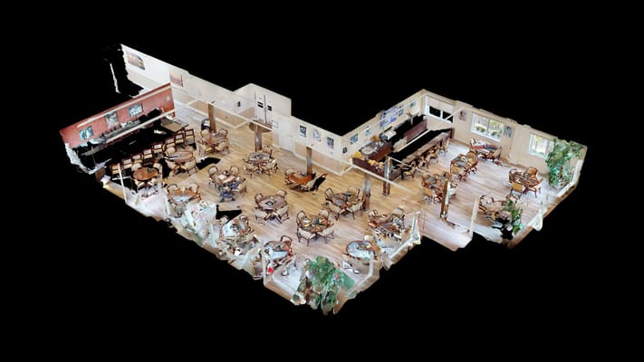 Aerial view of a dining area with tables and chairs