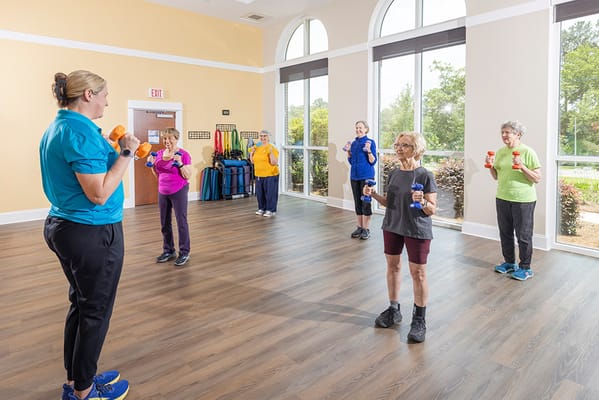 Residents participating in a group exercise class