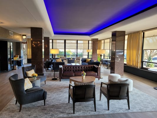 Bright common area with comfortable seating and natural light