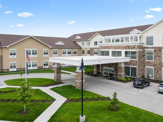 Exterior view of the facility with landscaped entrance
