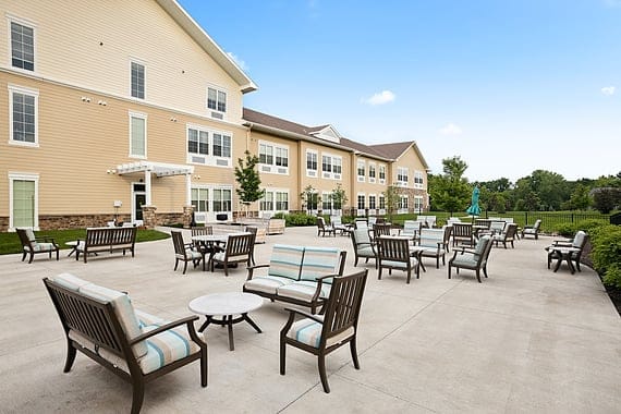 Outdoor seating area with chairs and tables