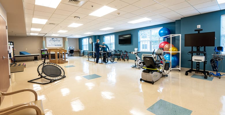 Interior view of a rehabilitation room with exercise equipment