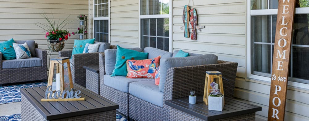 Welcoming outdoor seating area with colorful cushions
