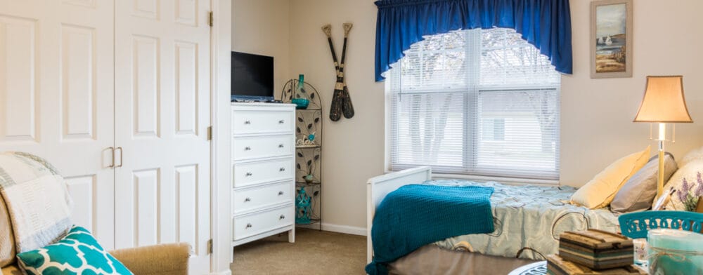 Cozy resident room with bed and storage