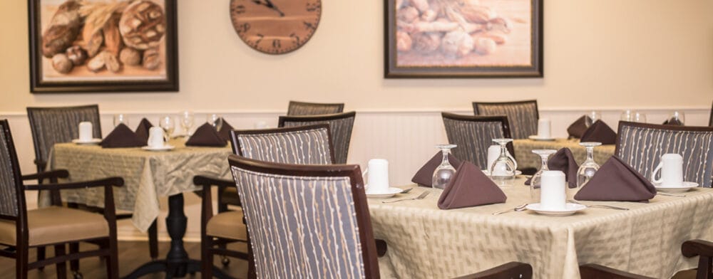 Elegant dining room setup with tables and decor