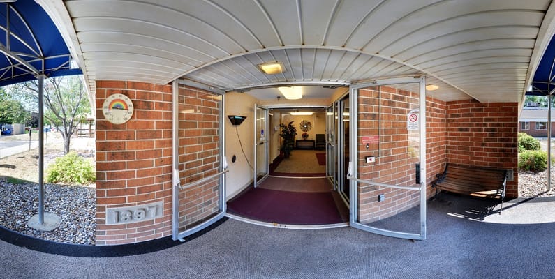 Entrance of Azria Health Park Place with doors open