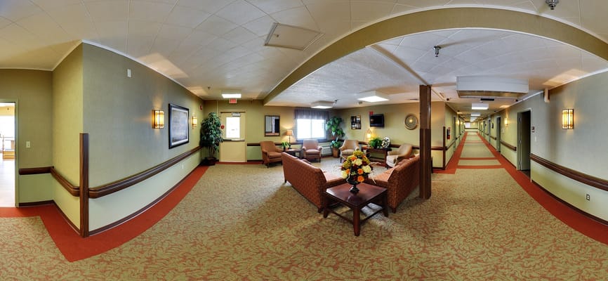 Common area with seating and decorative flowers