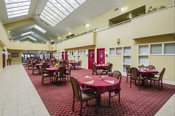Interior dining area with tables and red decor