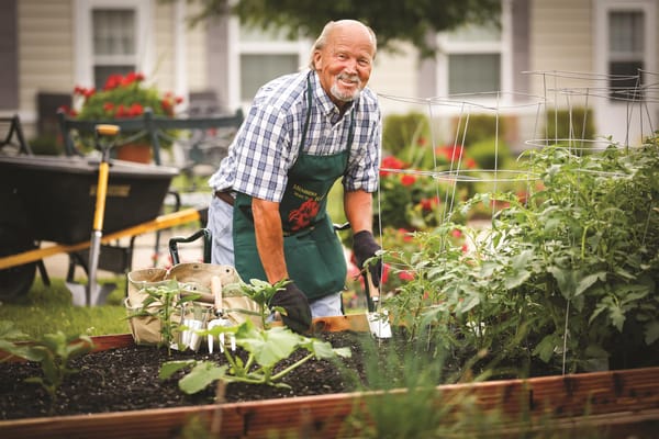 Senior resident tending to a garden
