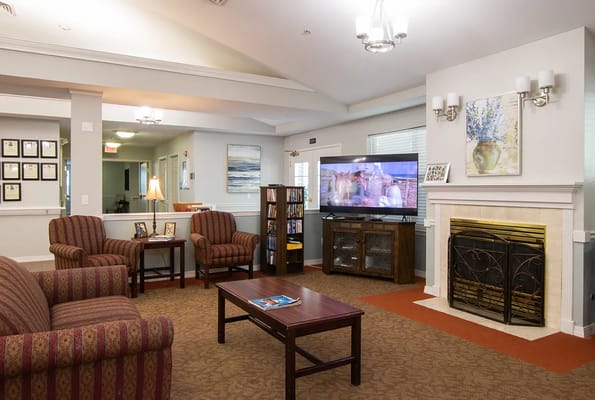 Cozy common area with seating and a television