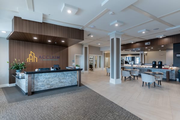 Modern interior lobby with reception desk and logo