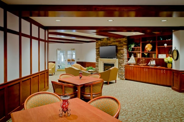 Cozy common area with seating and fireplace