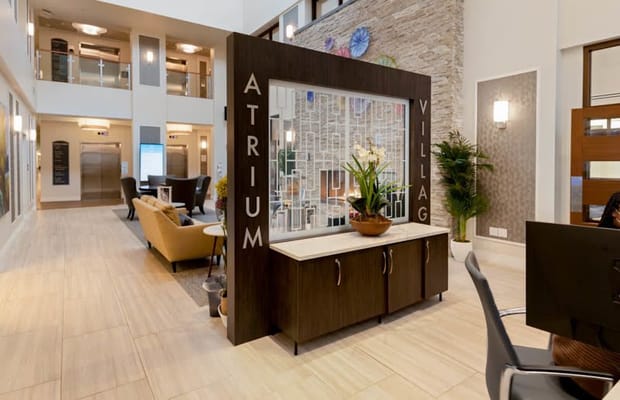 Interior view of Atrium Village's welcoming lobby area