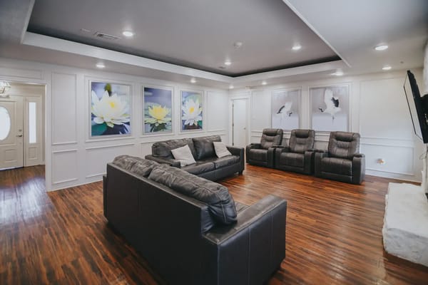 Modern common area with comfortable seating and artwork