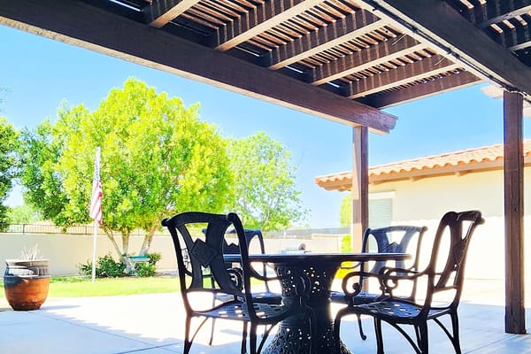 Outdoor seating area under a pergola