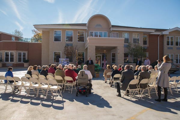 Residents and staff gathered outside for an event