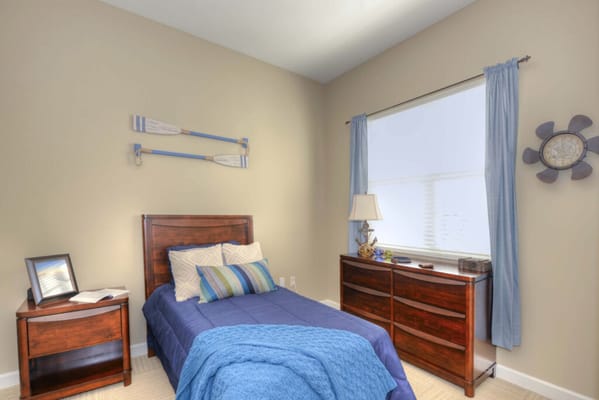 Cozy private resident room with nautical decor