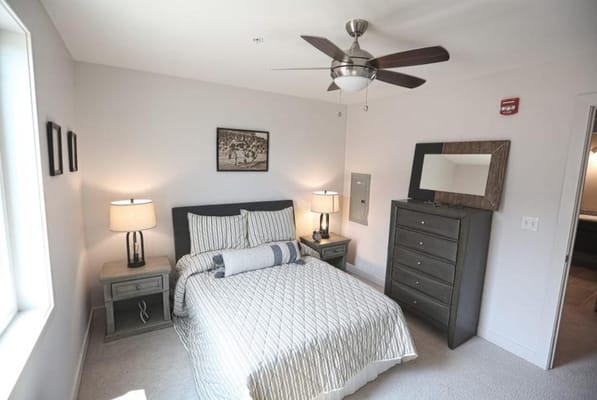 A well-decorated private bedroom in a senior living facility