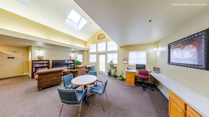 Bright interior of an activity room with seating