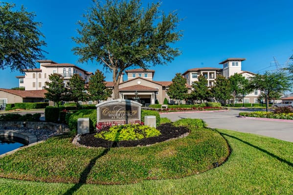 Exterior view of Conservatory at Plano with landscaping