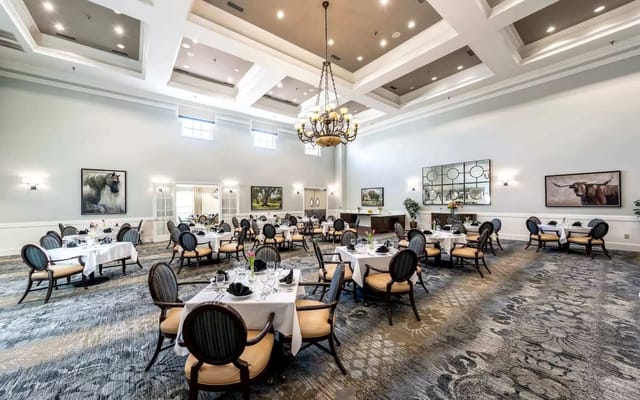 Elegant dining room setup with tables and chairs