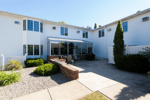Exterior view of the Countryside Manor building and patio