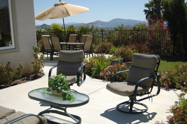 Outdoor seating area with tables and chairs