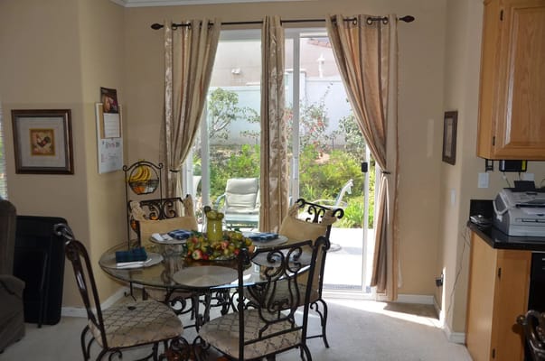 Cozy dining area with a view of the garden