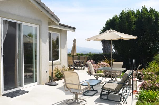 Patio area with seating and umbrellas