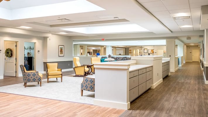 Spacious common area with seating at Demaree Crossing