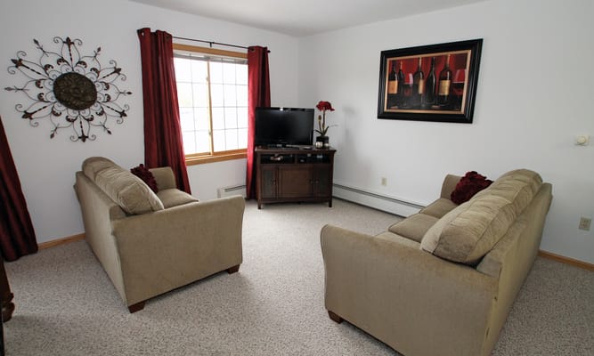 Cozy common area with seating and artwork