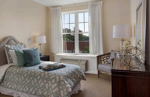 Cozy private room with natural light and decor