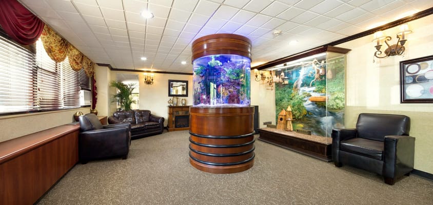Interior common area with an aquarium and seating