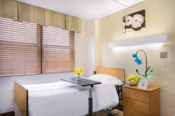 Cozy resident room with flowers and apples displayed