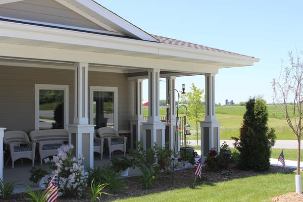 Exterior view of an assisted living facility's porch area