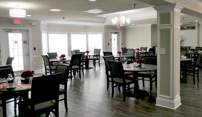 Dining area with tables set for a meal