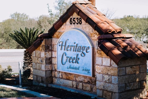 Exterior sign for Heritage Creek assisted living facility