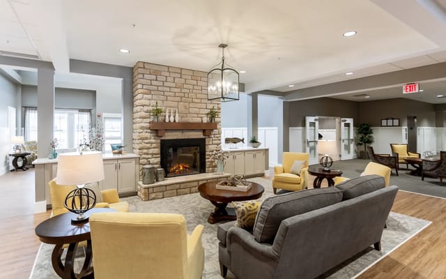 Comfortable common area with seating and a fireplace