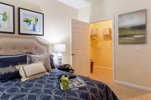 A cozy private room with a bed and closet