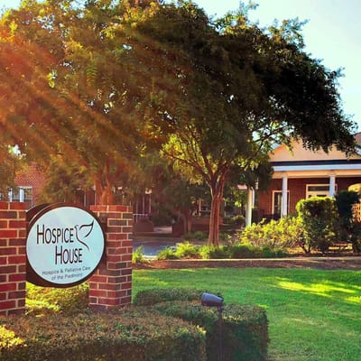 Exterior view of Hospice House with landscaping