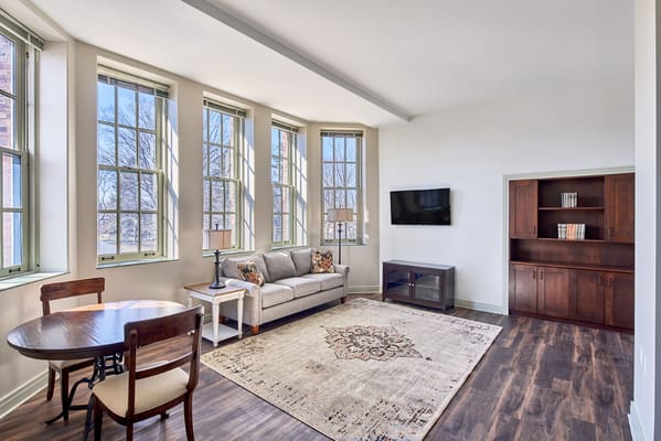 Bright interior of a living space with a sofa and table